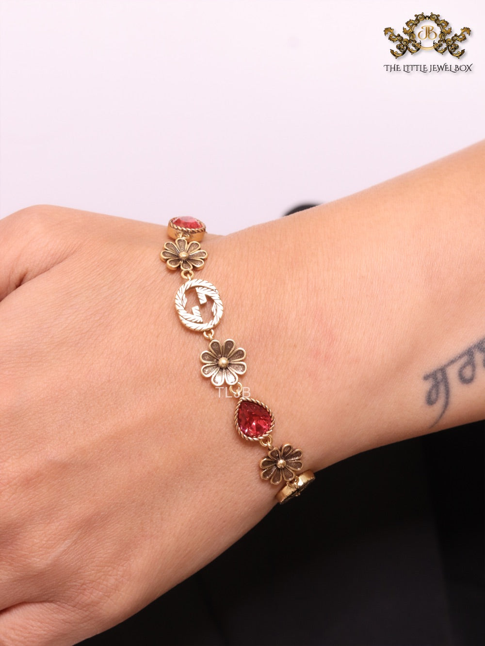 Rustic gold Double G and flowers bracelet with ruby