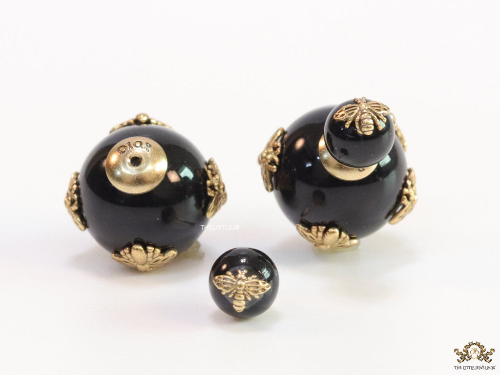 Designer pearl earrings with matte gold flying bee motifs