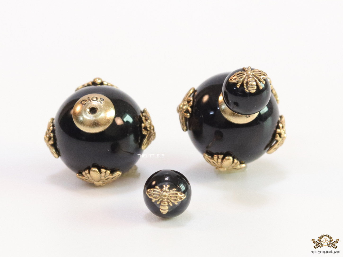 Designer pearl earrings with matte gold flying bee motifs