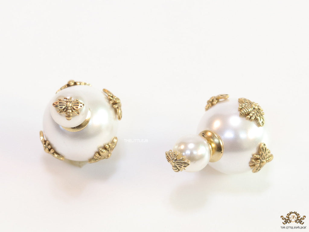 Designer pearl earrings with matte gold bee motifs