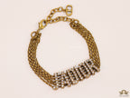 Multichain bracelet with cz alphabets in antique gold finish