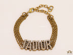 Multichain bracelet with cz alphabets in antique gold finish
