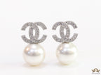 Twin C motif stud in platinum and cz with pearl drop