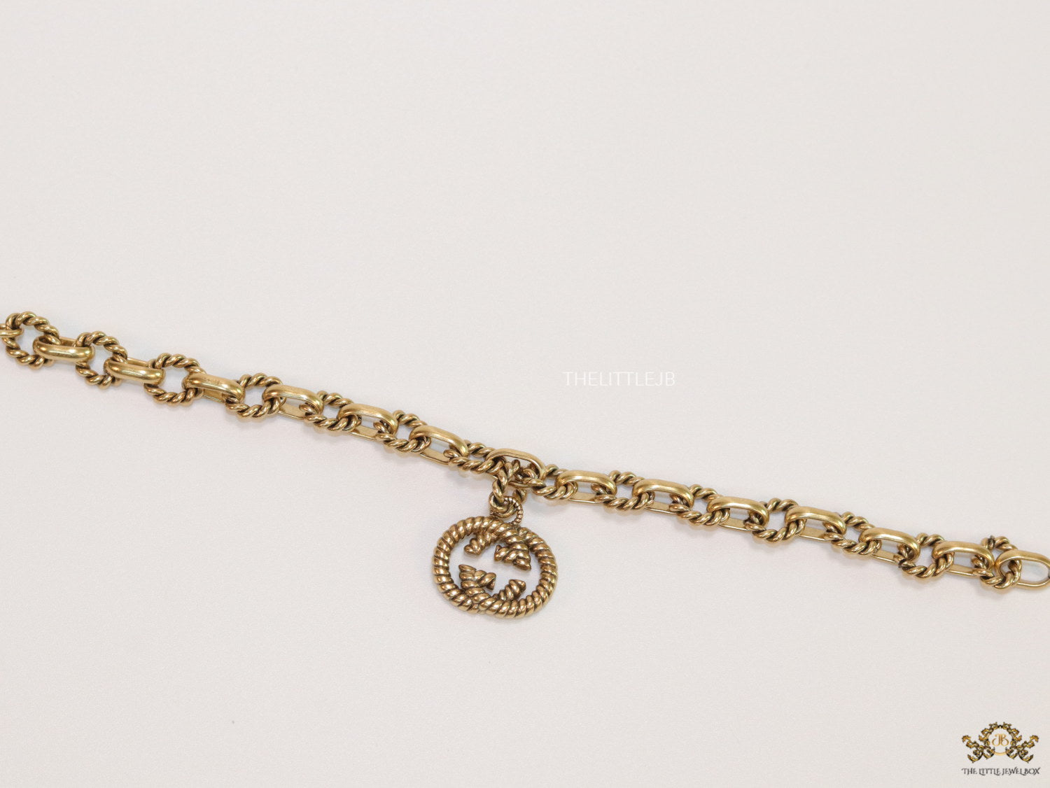 Fancy link chain antique gold finish bracelet with double G motif