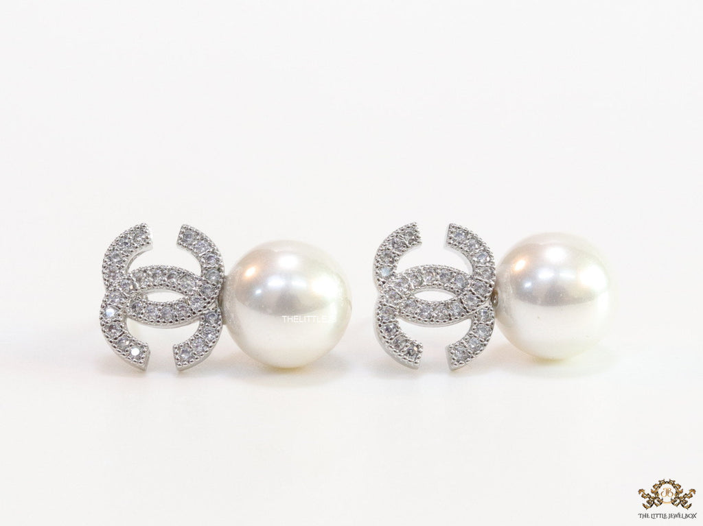 Twin C motif stud in platinum and cz with pearl drop