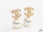 Twin C motif stud in gold and cz with pearl drop