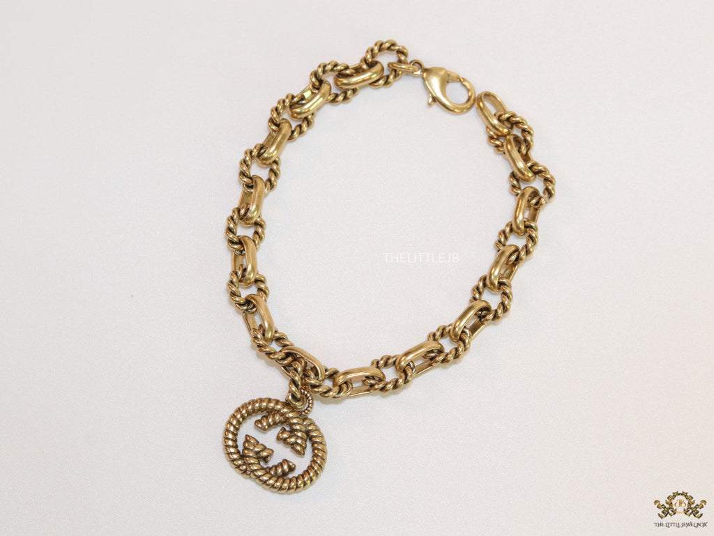 Fancy link chain antique gold finish bracelet with double G motif