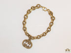 Fancy link chain antique gold finish bracelet with double G motif