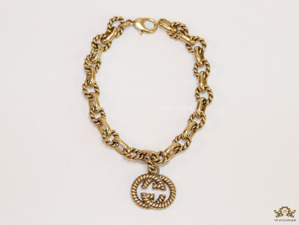 Fancy link chain antique gold finish bracelet with double G motif