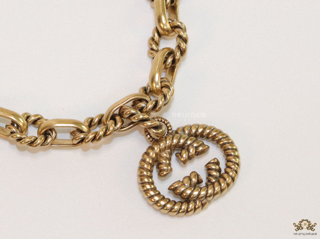 Fancy link chain antique gold finish bracelet with double G motif