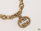 Fancy link chain antique gold finish bracelet with double G motif