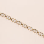 Openable golden Cand D motif bracelet