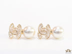 Golden cz baguettes studded twin C motif stud with pearl drop