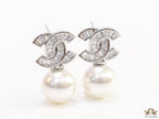 Platinum cz baguettes studded twin C motif stud with pearl drop