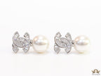 Platinum cz baguettes studded twin C motif stud with pearl drop
