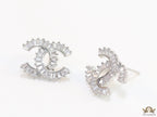 Platinum plated twin C motif studs in cz baguettes