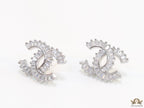 Platinum plated twin C motif studs in cz baguettes
