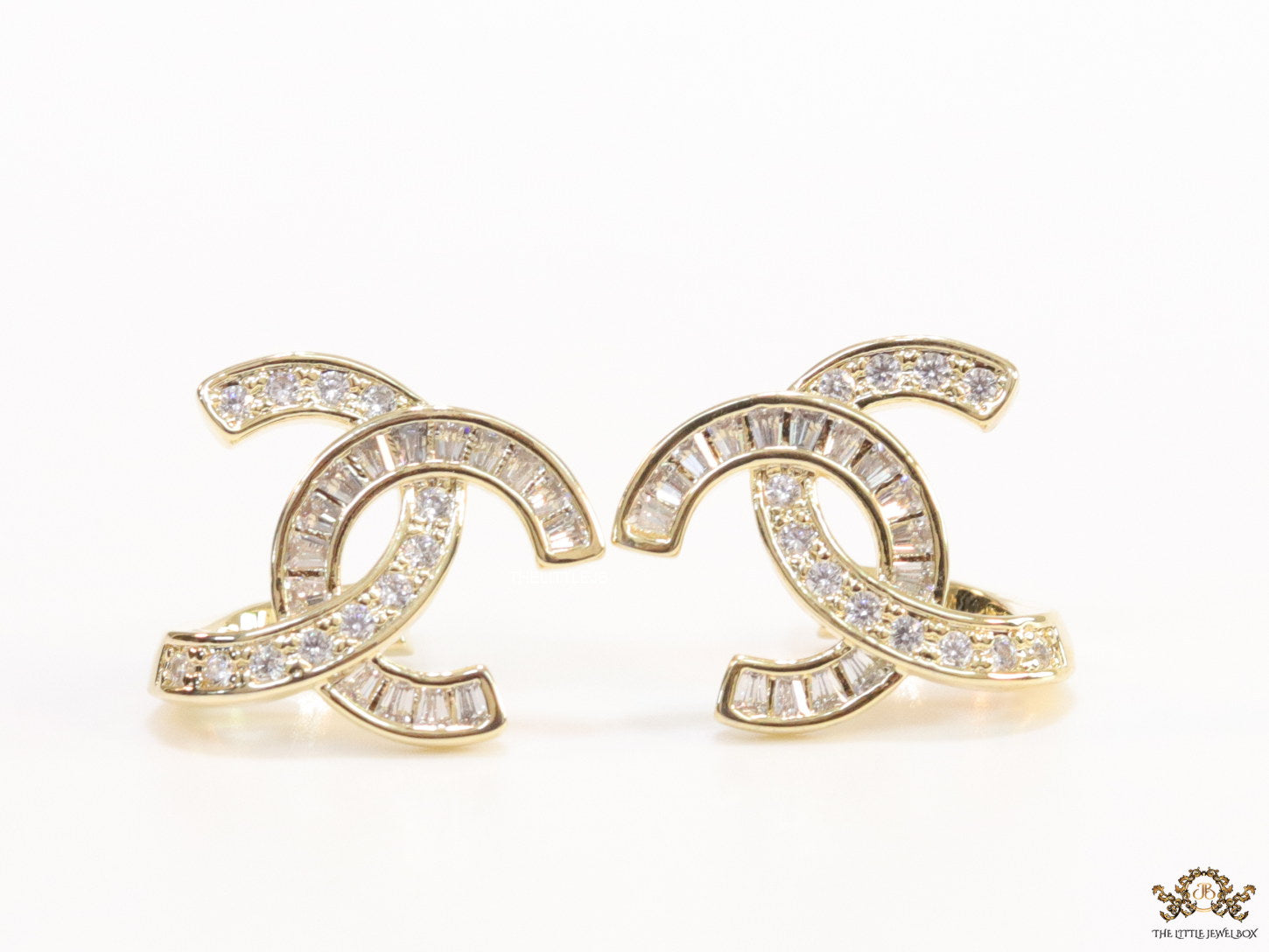 Gold plated twin C motif studs in cz and baguettes