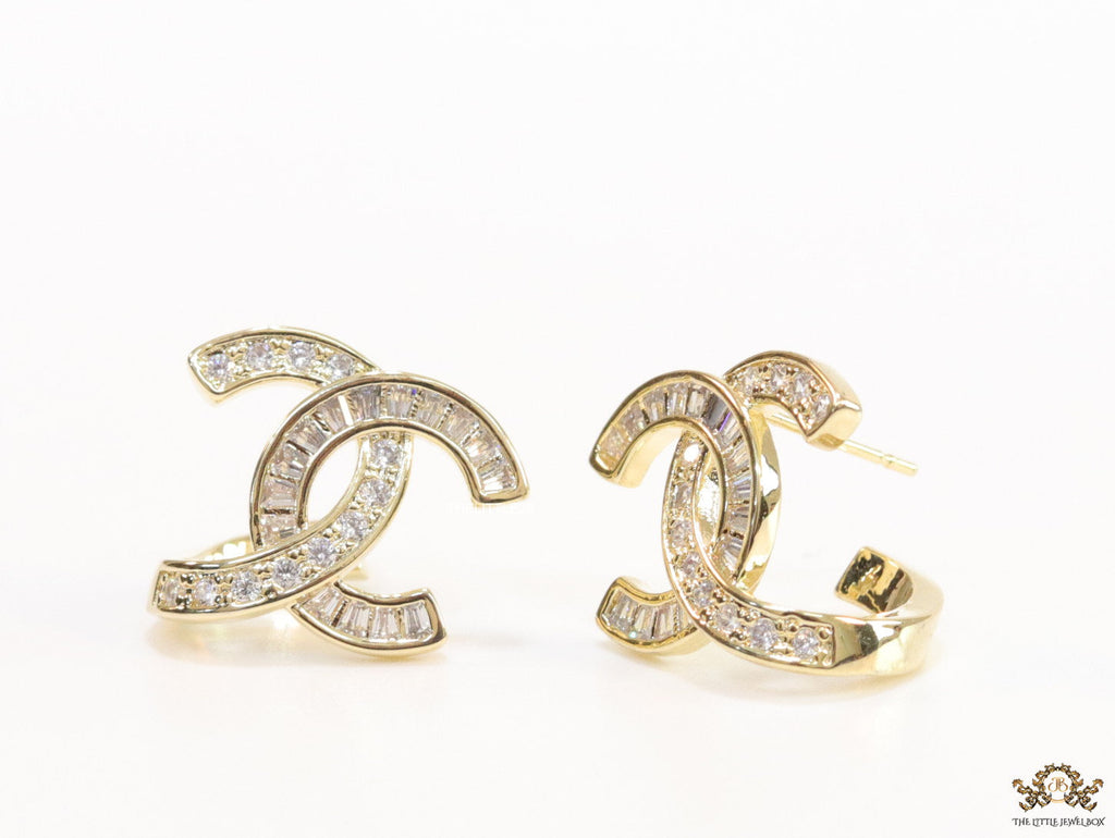 Gold plated twin C motif studs in cz and baguettes