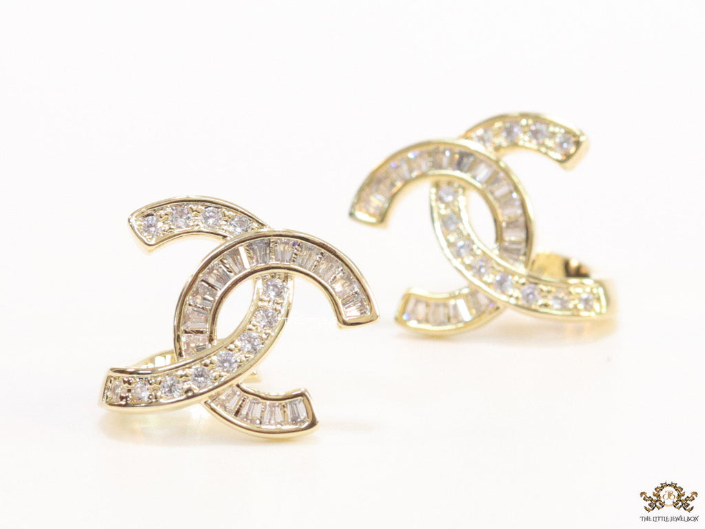 Gold plated twin C motif studs in cz and baguettes
