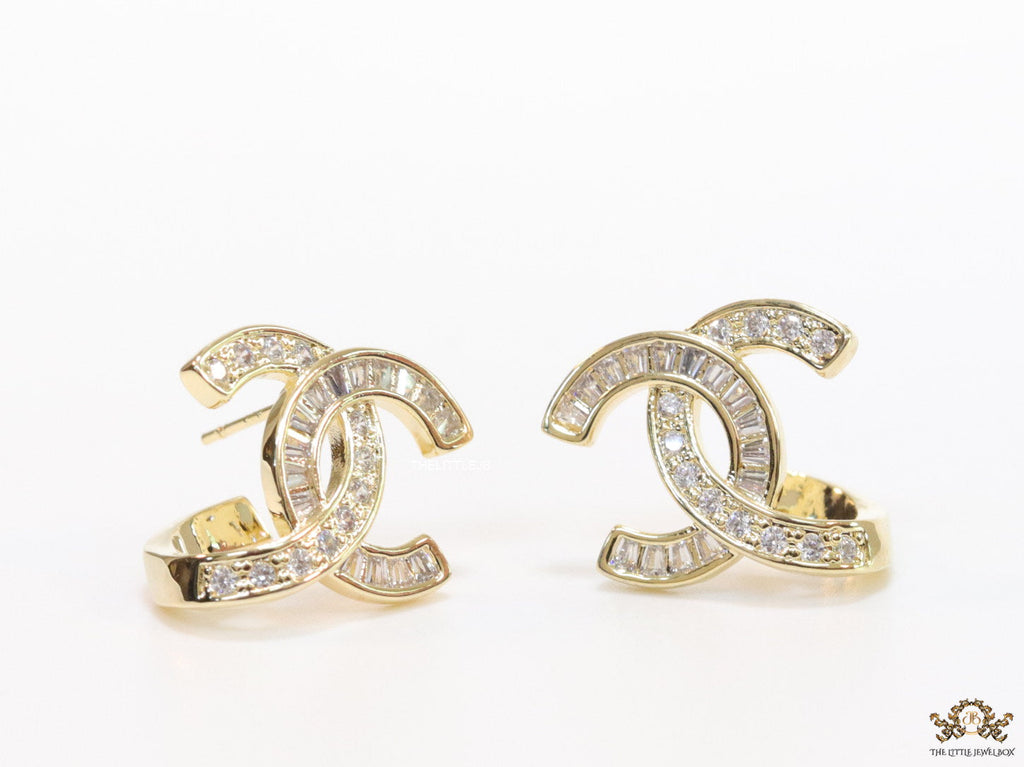 Gold plated twin C motif studs in cz and baguettes
