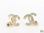 Gold plated twin C motif studs in cz and baguettes