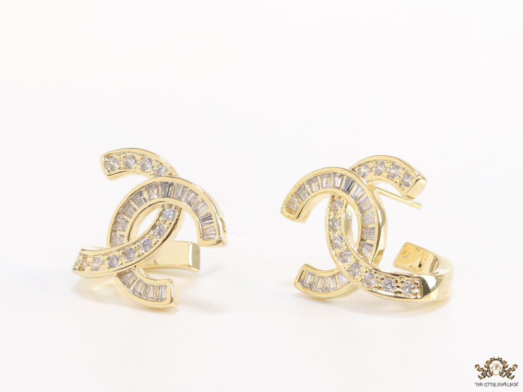 Gold plated twin C motif studs in cz and baguettes