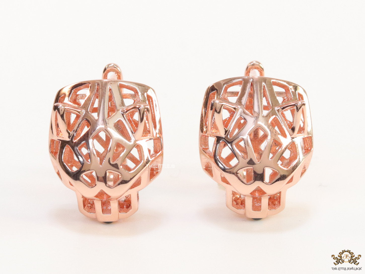 Rose gold plated panther face clip back studs in cutwork