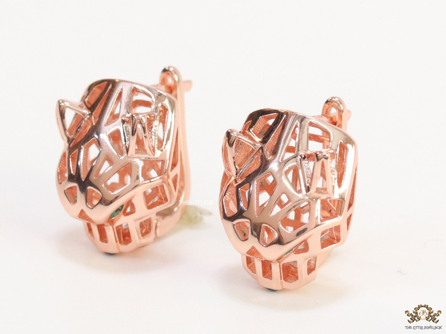 Rose gold plated panther face clip back studs in cutwork