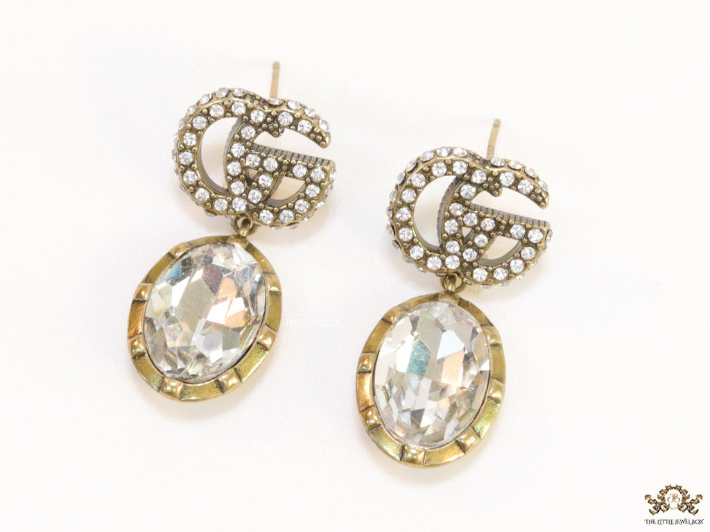 Rustic double G earrings with white drop