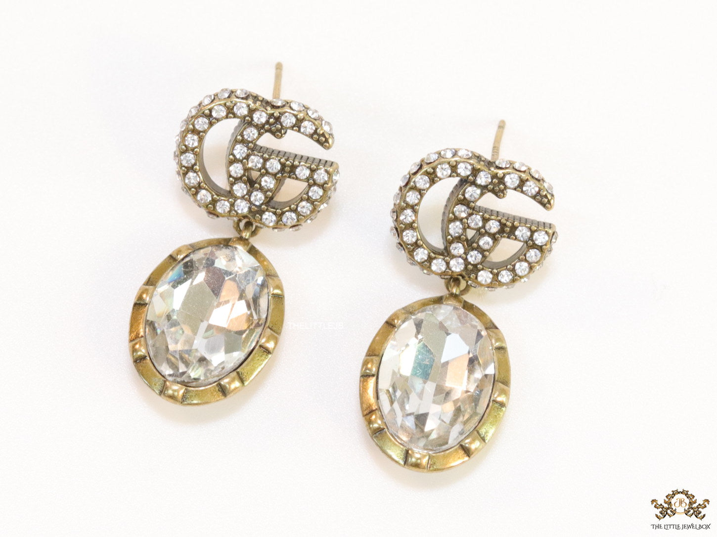 Rustic double G earrings with white drop