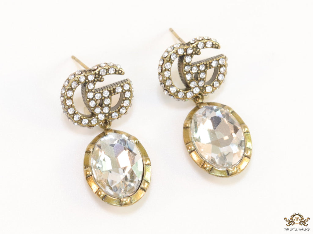 Rustic double G earrings with white drop