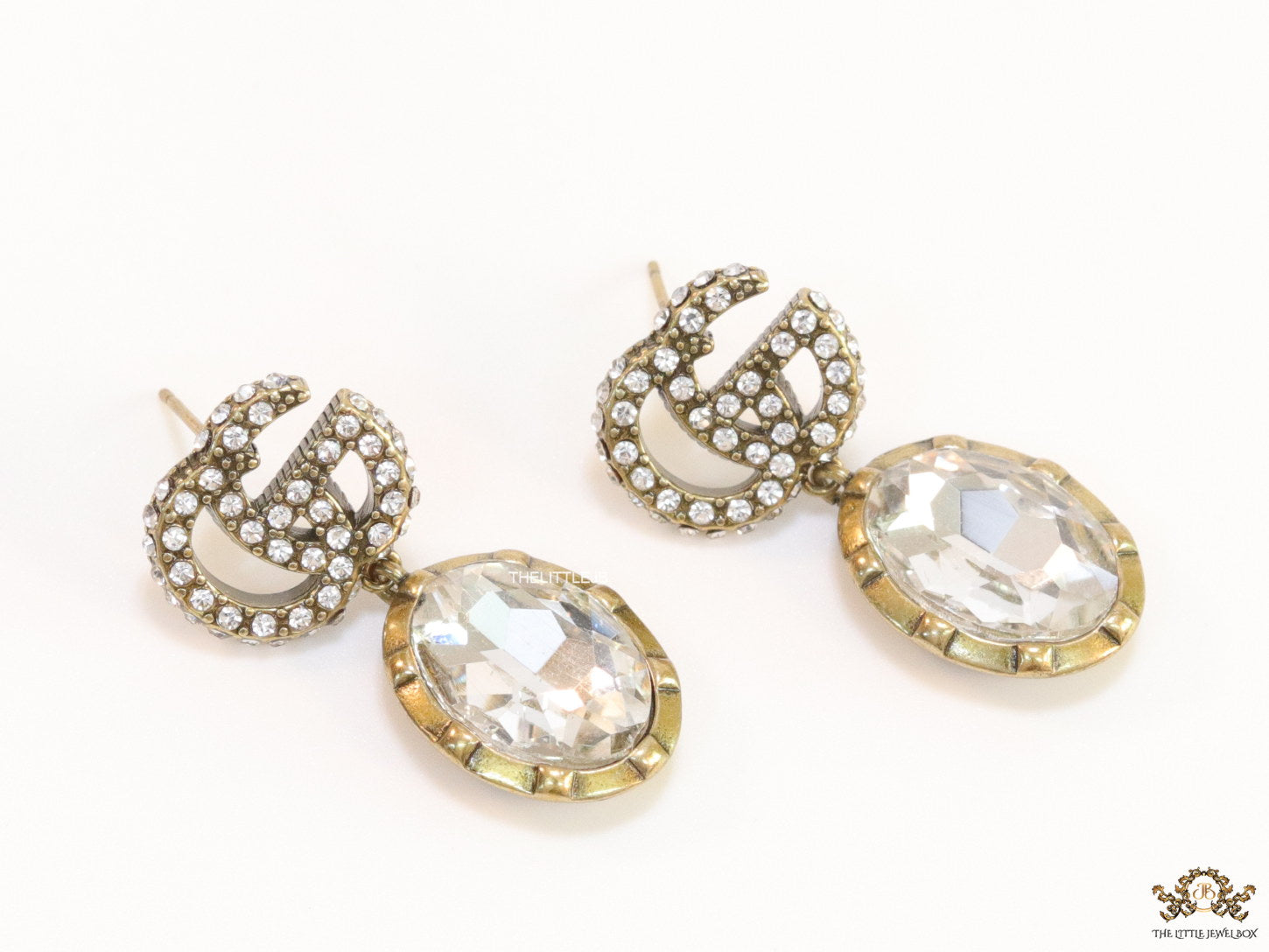 Rustic double G earrings with white drop