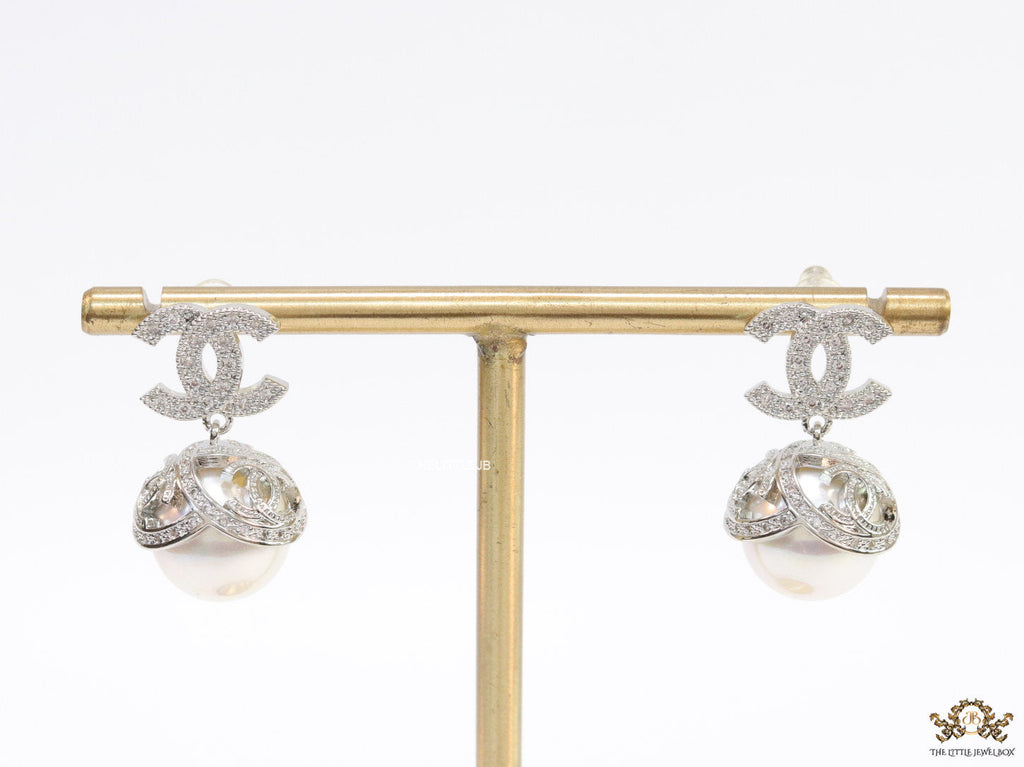 Platinum plated twin C earrings in cz with cz capped pearl drop