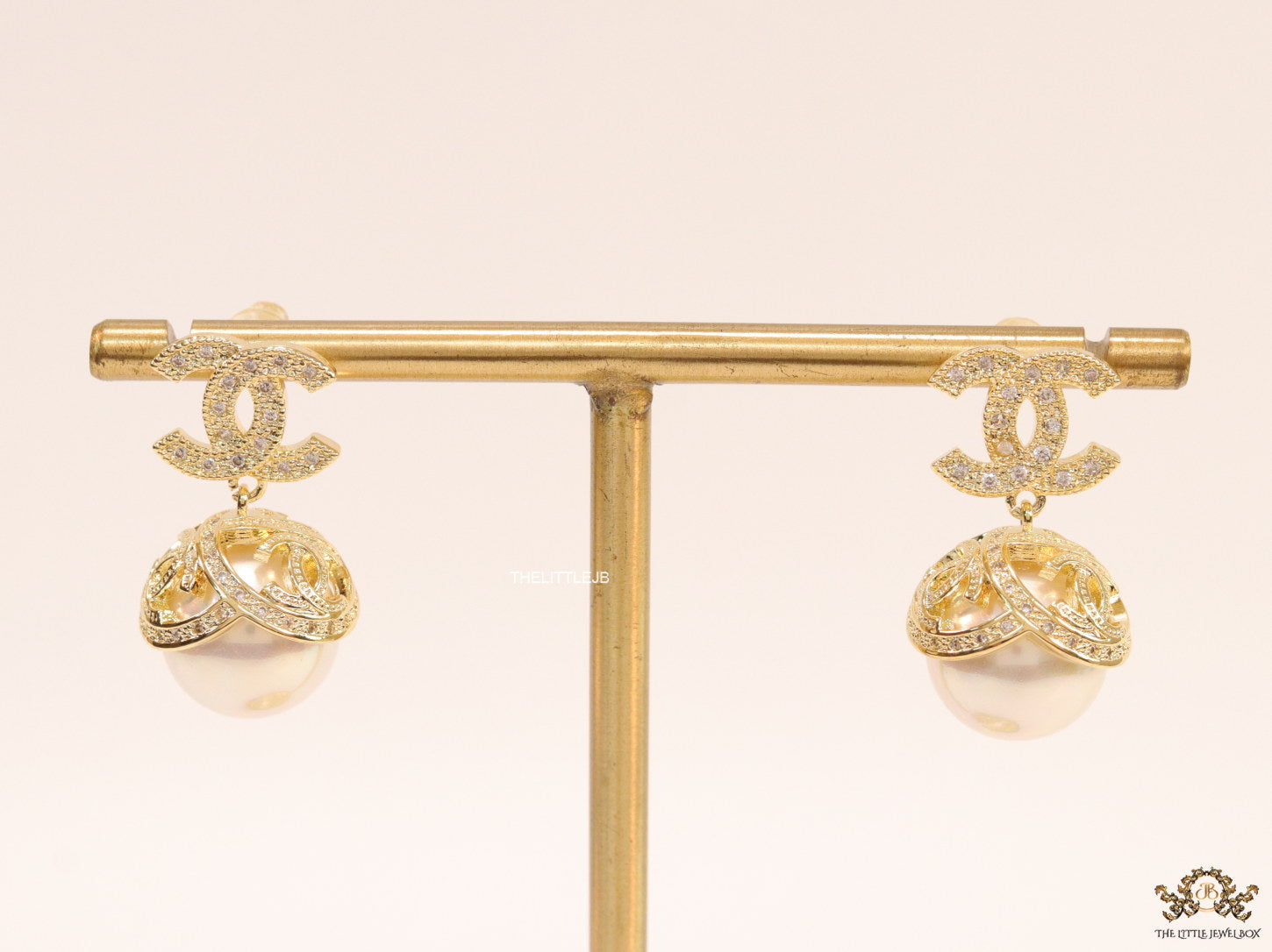 Gold plated twin C earrings in cz with cz capped pearl drop
