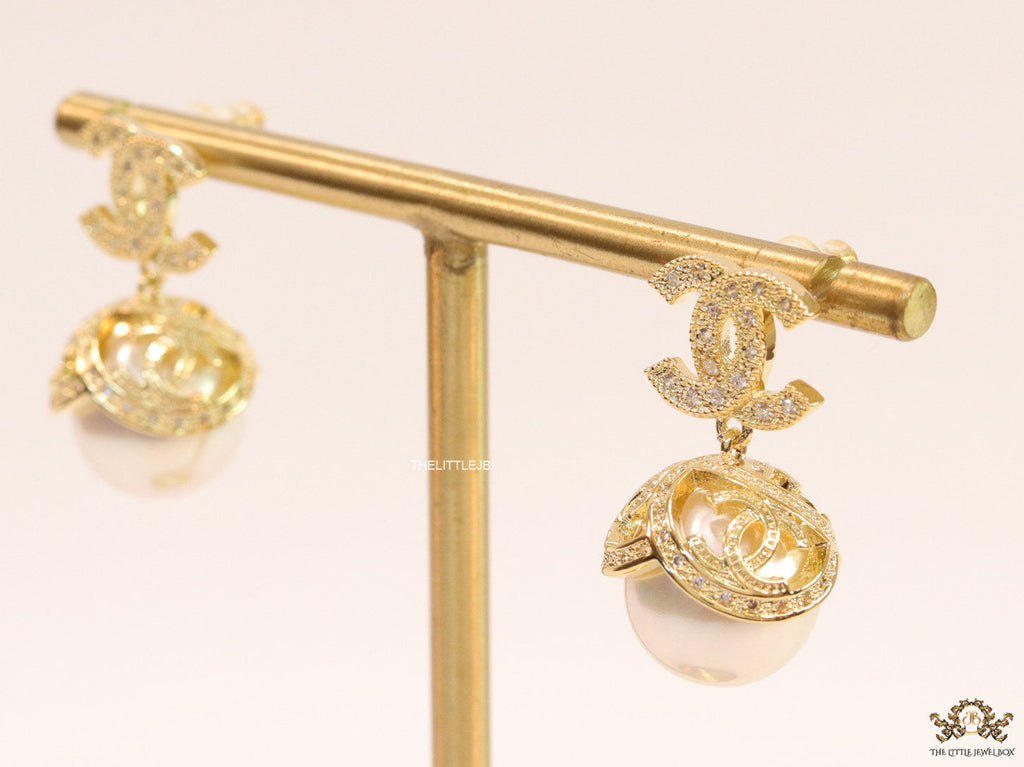 Gold plated twin C earrings in cz with cz capped pearl drop