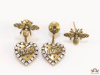 Antique golden bee earrings with alphabet inscribed heart shaped drop