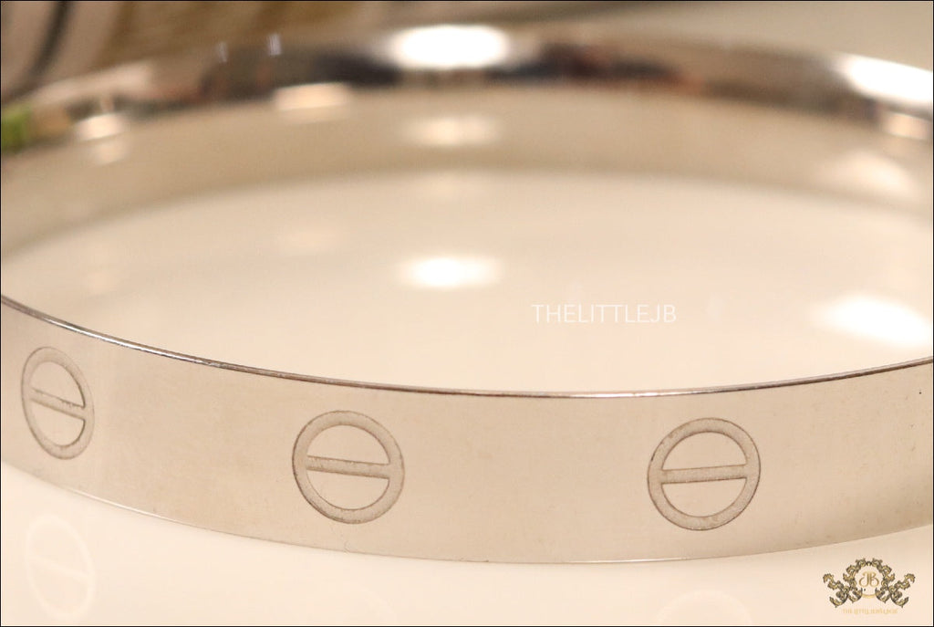 Men's bracelet with screws in platinum finish