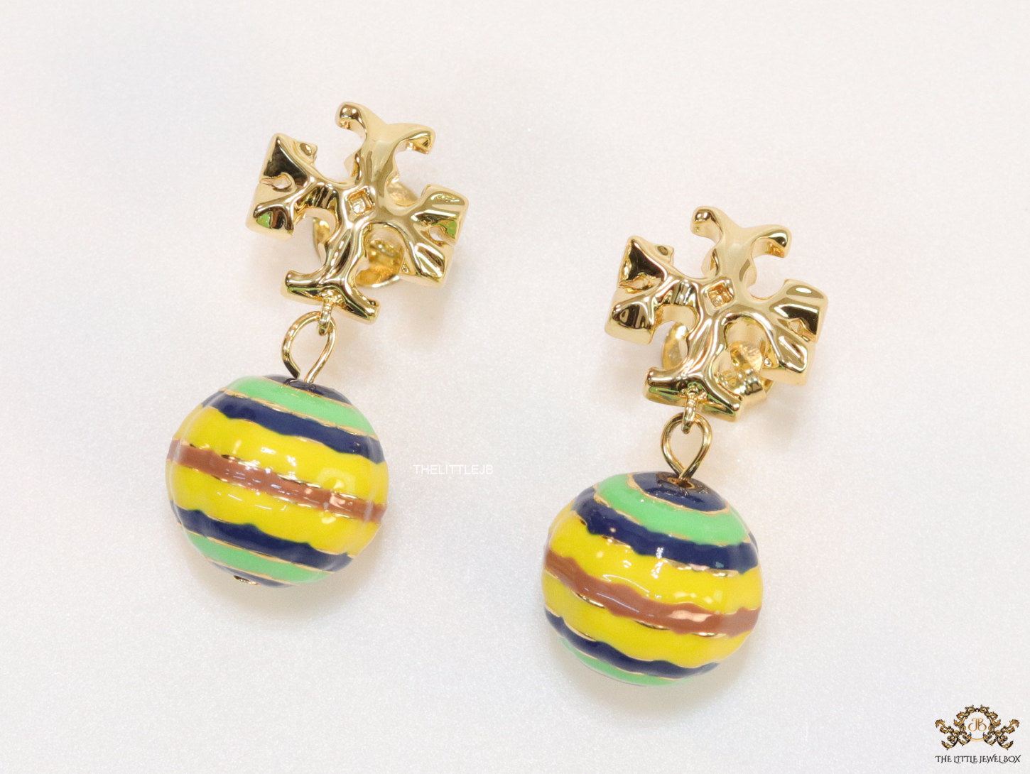 Enamel coated round drop earrings in gold plating