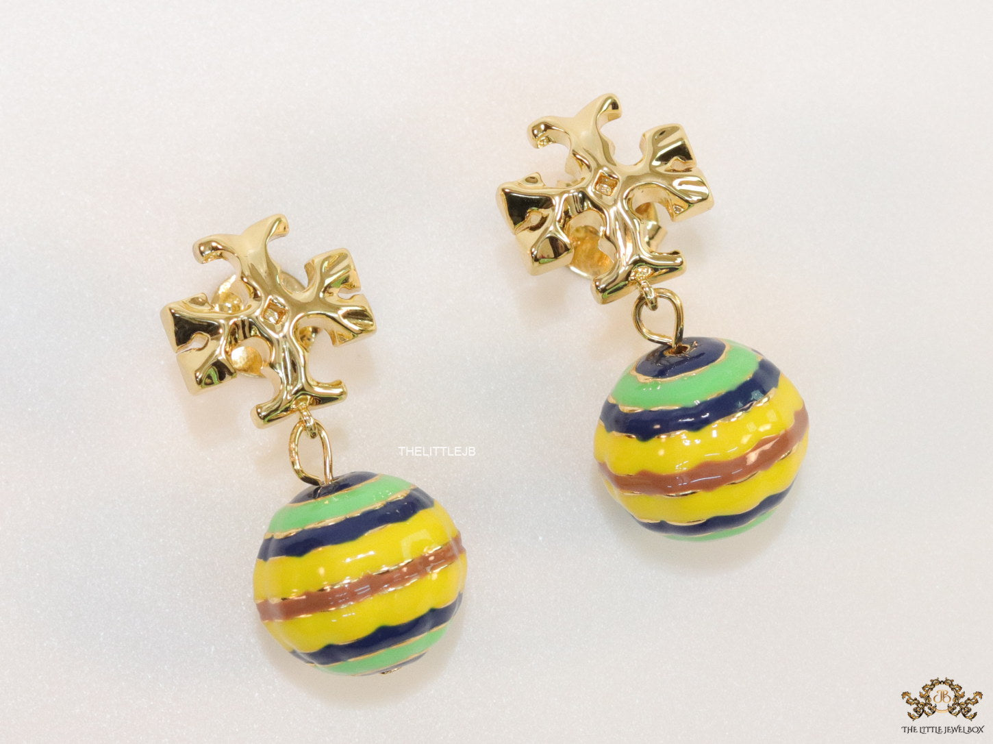 Enamel coated round drop earrings in gold plating