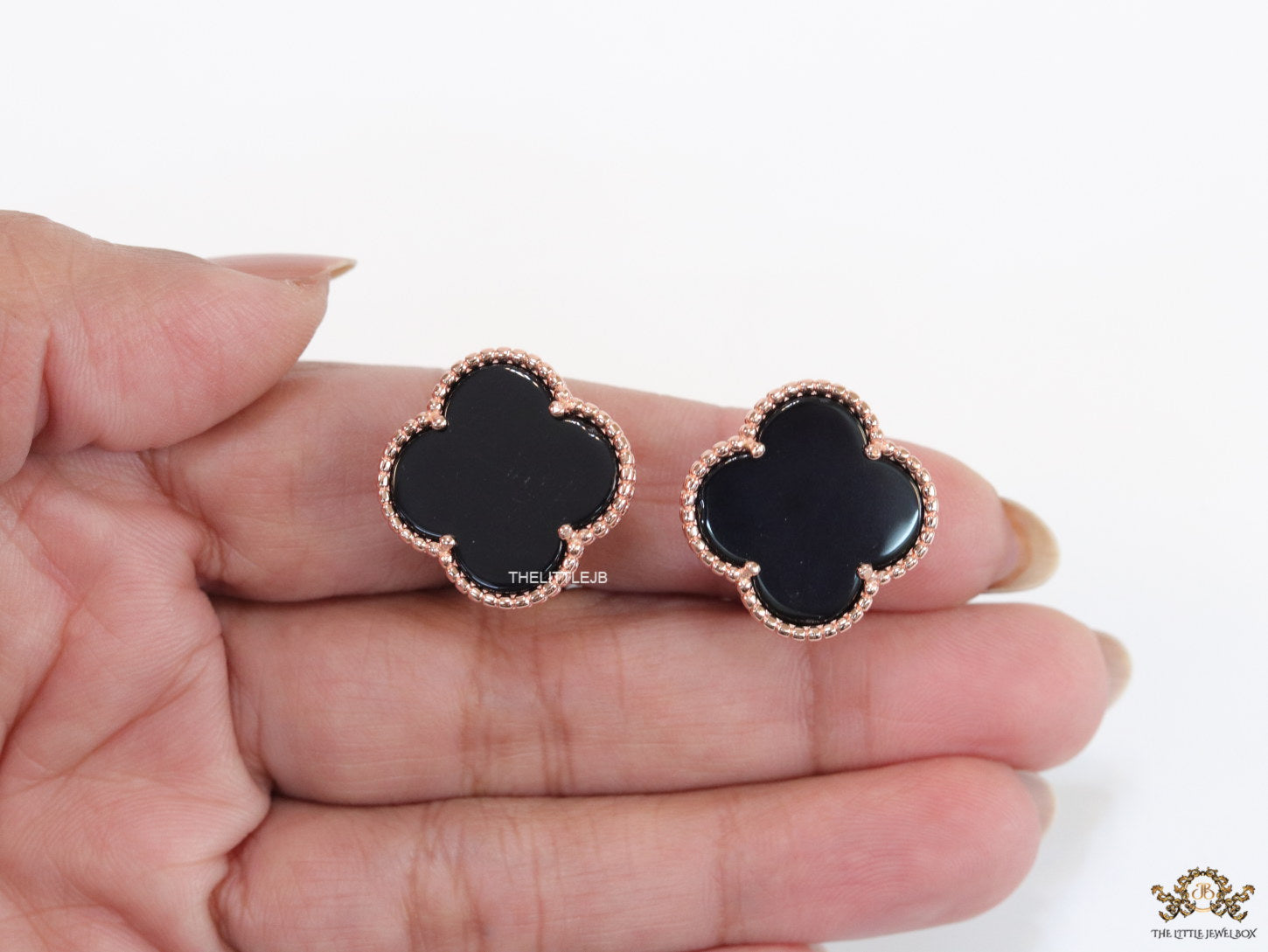 Black clover stud earrings in rose gold plating