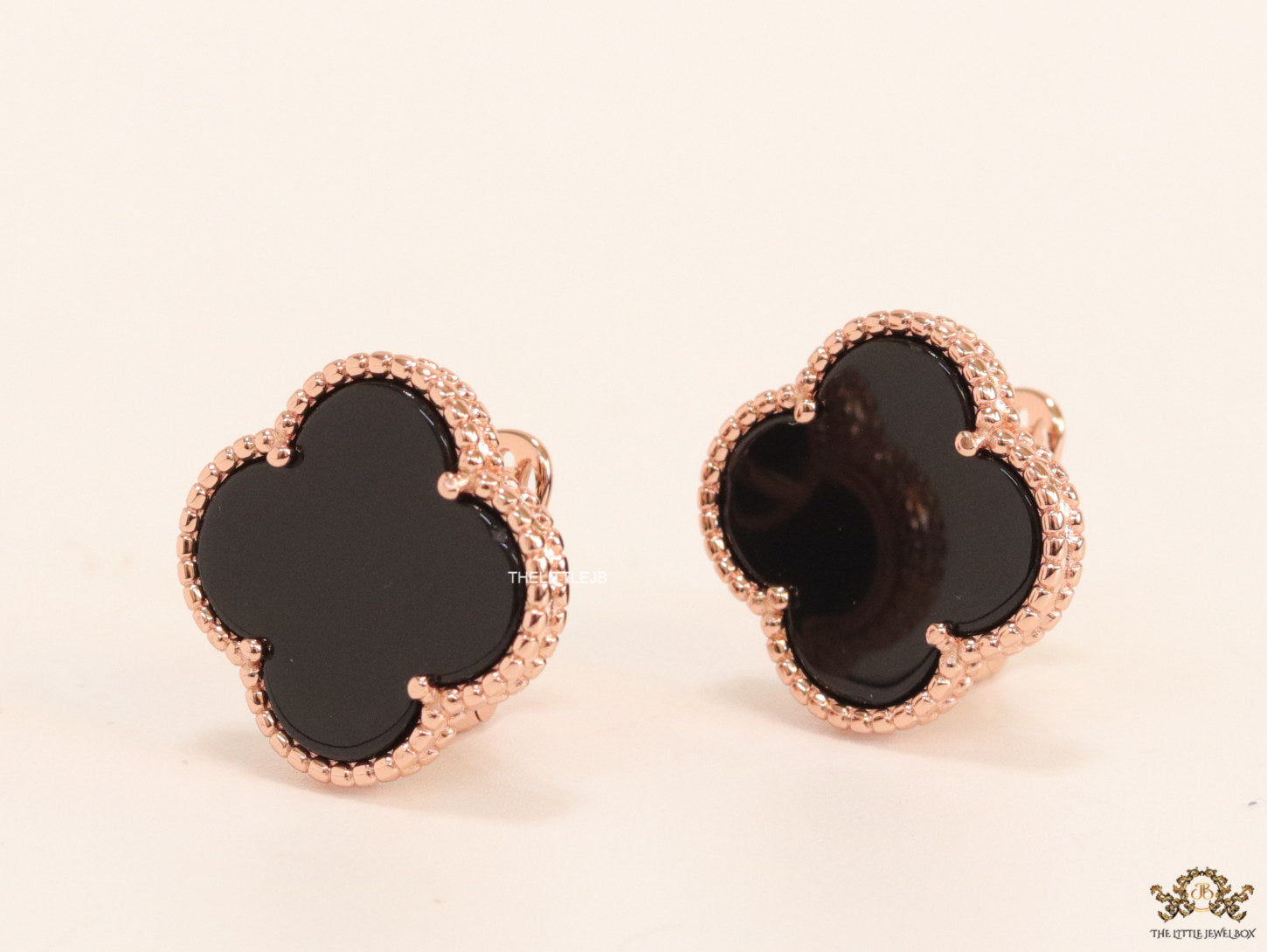 Black clover stud earrings in rose gold plating
