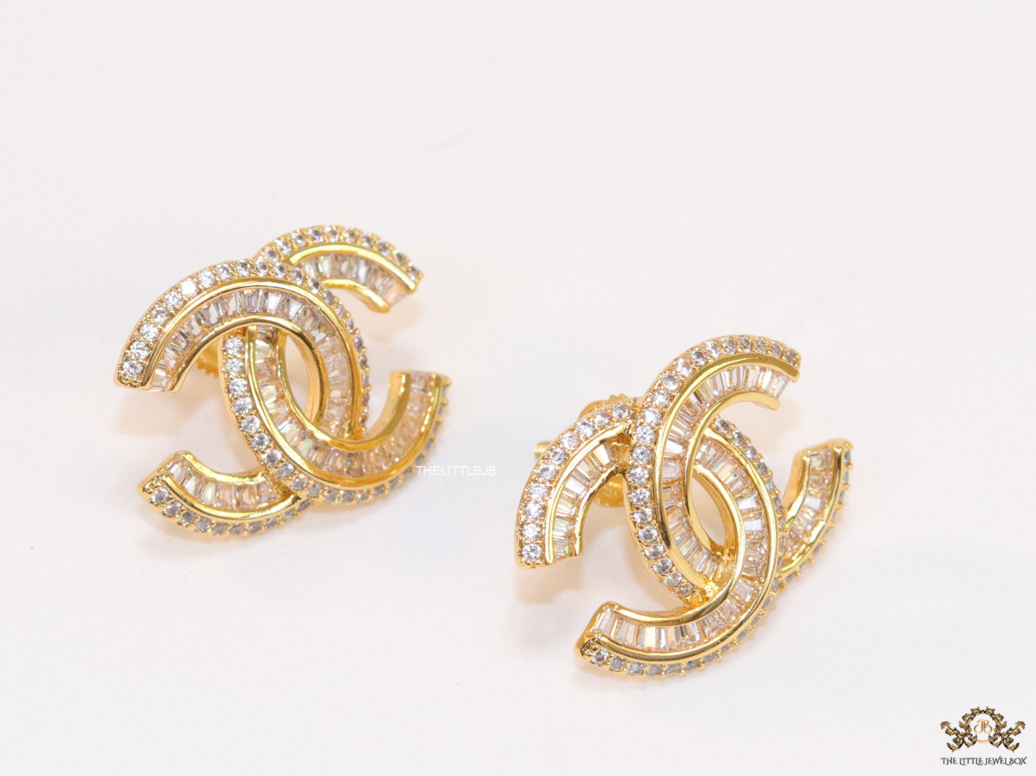 Gold plated cz studs in twin C motif