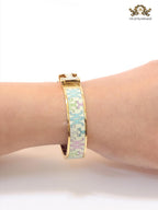 Alphabet H baby pink and blue motifs on white bracelet