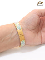 Alphabet H baby pink and blue motifs on white bracelet