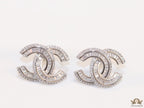 Platinum plated cz studs in twin C motif