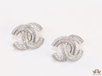 Platinum plated cz studs in twin C motif