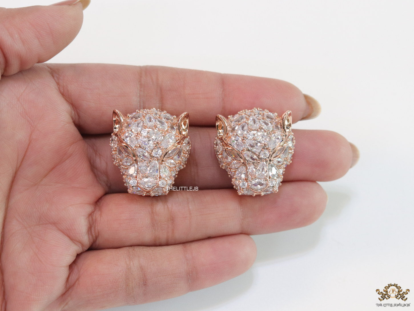 Panther head stud earrings in rose gold and cz