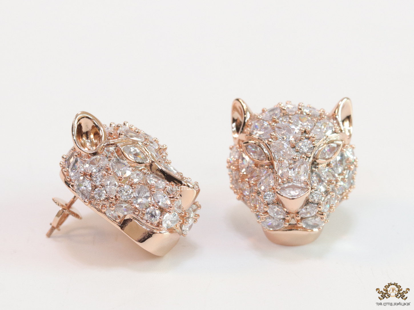 Panther head stud earrings in rose gold and cz