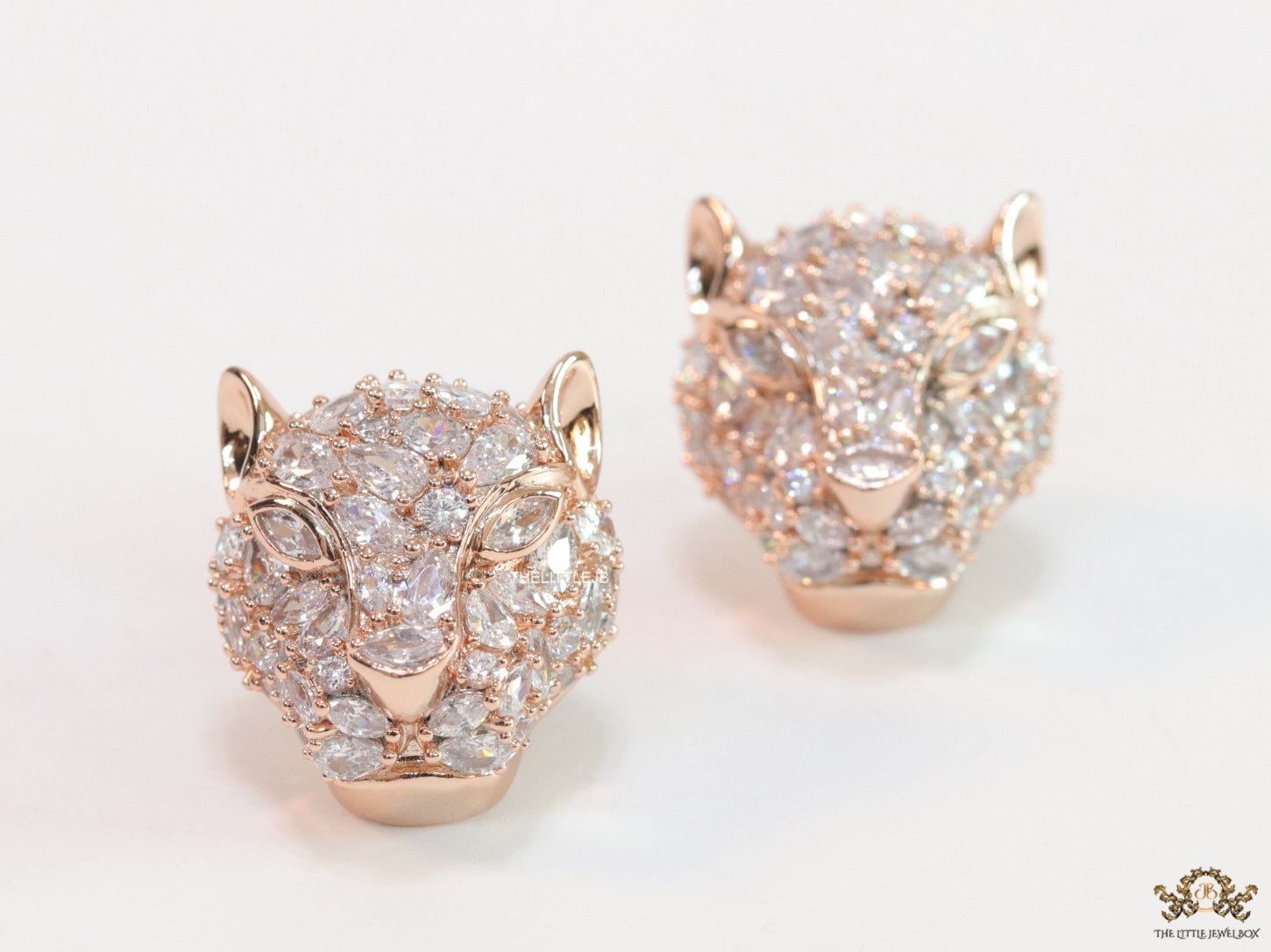 Panther head stud earrings in rose gold and cz